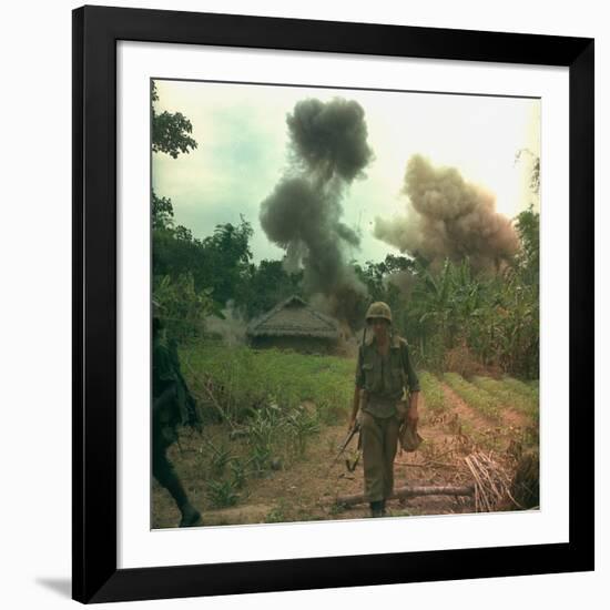 US Marines Walk Away from Blown Up Viet Cong Base, May 1966-null-Framed Photo