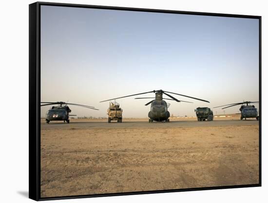 US Military Vehicles and Aircraft Lined Up on the Taxiway at Camp Speicher, Iraq-null-Framed Stretched Canvas