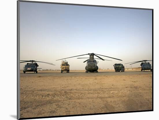 US Military Vehicles and Aircraft Lined Up on the Taxiway at Camp Speicher, Iraq-null-Mounted Photographic Print