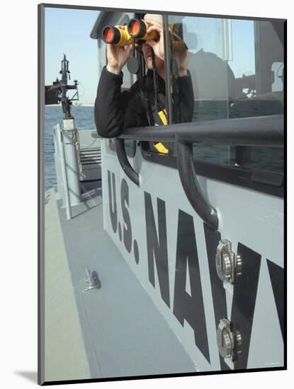 Us Navy Mate Looks Through Binoculars as He Patrols the Coastal Waters of the Persian Gulf-Stocktrek Images-Mounted Photographic Print