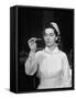 US Navy Nurse in Uniform Reading a Thermometer-null-Framed Stretched Canvas