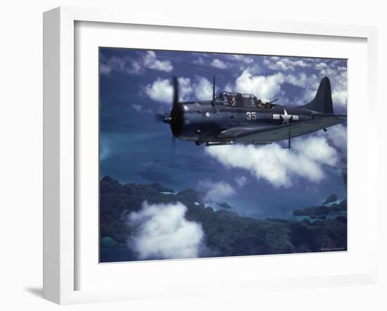 US Navy SBD Dauntless in Flight During Palau Islands Air Raid Attack-J^ R^ Eyerman-Framed Photographic Print