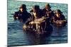 US Navy SEAL Team Emerges from Water During Warfare Training, Dec. 1, 1986-null-Mounted Photo