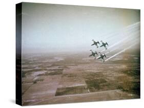 US Navy Stunt Pilots of the Blue Angels Flying their F9F Jets During an Air Show-J^ R^ Eyerman-Stretched Canvas