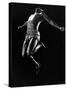 US Pentathlon Champion John Borican at the Peak of His Broad Jump-Gjon Mili-Stretched Canvas