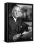 US Pres. Franklin D. Roosevelt Sitting at Desk and Holding Piece of Paper in Office, in White House-null-Framed Stretched Canvas