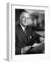 US Pres. Franklin D. Roosevelt Sitting at Desk and Holding Piece of Paper in Office, in White House-null-Framed Photographic Print