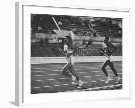 US Rafer Johnson and Nat. China Yang Chuan Kwang During Running Event at Olympics-null-Framed Premium Photographic Print