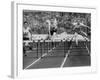 US Runner Fanny Blankers Koen Setting Olympic Record of 11.2 Seconds in 80 Meter Hurdles-Mark Kauffman-Framed Premium Photographic Print