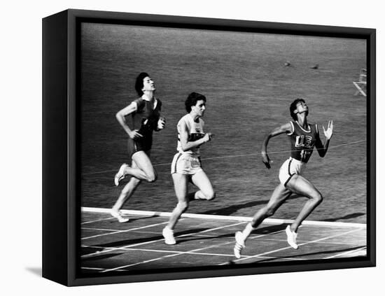 US Runner Wilma Rudolph Winning Women's 100 Meter Race at Olympics-Mark Kauffman-Framed Stretched Canvas