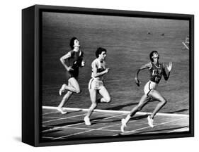 US Runner Wilma Rudolph Winning Women's 100 Meter Race at Olympics-Mark Kauffman-Framed Stretched Canvas