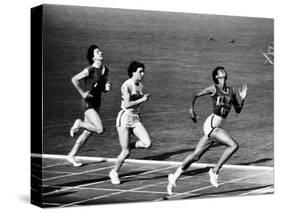 US Runner Wilma Rudolph Winning Women's 100 Meter Race at Olympics-Mark Kauffman-Stretched Canvas
