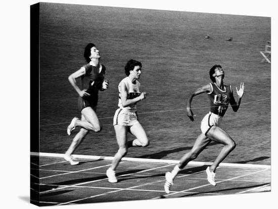 US Runner Wilma Rudolph Winning Women's 100 Meter Race at Olympics-Mark Kauffman-Stretched Canvas