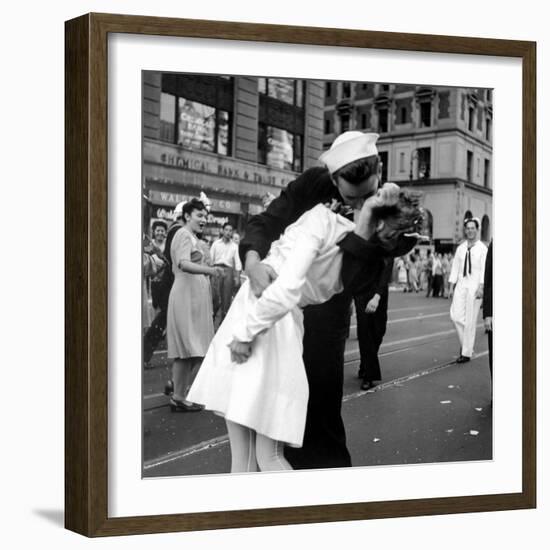 US Sailor Bending Young Nurse over His Arm to Give Her Passionate Kiss in Middle of Times Square-Victor Jorgensen-Framed Photographic Print