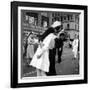 US Sailor Bending Young Nurse over His Arm to Give Her Passionate Kiss in Middle of Times Square-Victor Jorgensen-Framed Photographic Print