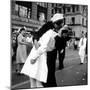 US Sailor Bending Young Nurse over His Arm to Give Her Passionate Kiss in Middle of Times Square-Victor Jorgensen-Mounted Photographic Print