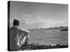US Sailor Watching Navy Vessels on the Horizon-Carl Mydans-Stretched Canvas