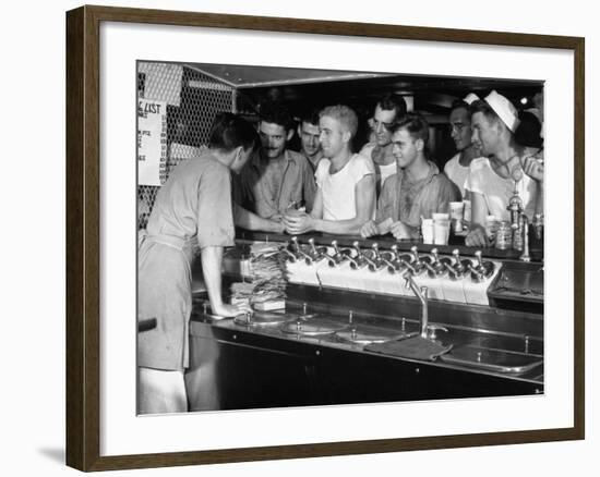 US Sailors Crowding around the Soda Fountain Aboard a Battleship-Carl Mydans-Framed Premium Photographic Print