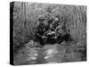 US Soldiers Carry a Wounded Comrade Through a Swampy Area in Vietnam, 1969-null-Stretched Canvas