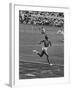 US Sprinter, Wilma Rudolph, Winning Women's 100 Meter Dash in Olympics-George Silk-Framed Premium Photographic Print