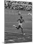 US Sprinter, Wilma Rudolph, Winning Women's 100 Meter Dash in Olympics-George Silk-Mounted Premium Photographic Print