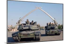 US Tanks Drive under the 'Hands of Victory' in Baghdad, Iraq, Ca. 2003-null-Mounted Photo