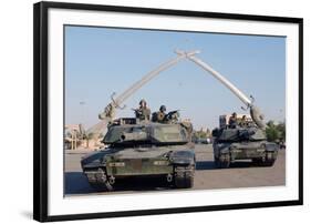 US Tanks Drive under the 'Hands of Victory' in Baghdad, Iraq, Ca. 2003-null-Framed Photo