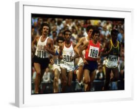 US Track Athlete Frank Shorter Running a Marathon at the Summer Olympics-John Dominis-Framed Premium Photographic Print