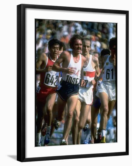 US Track Athlete Steve Prefontaine Running a Race at the Summer Olympics-null-Framed Premium Photographic Print