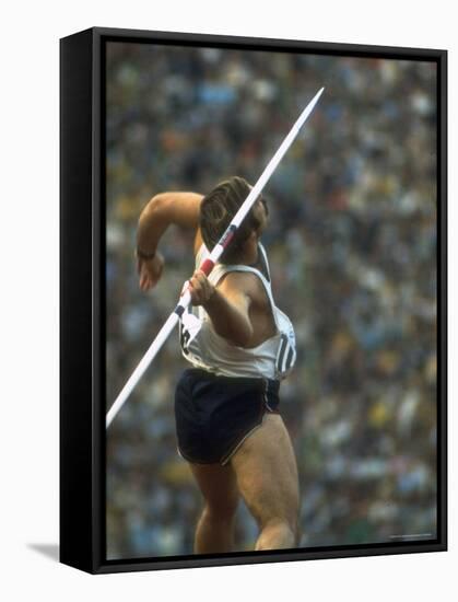 US Track Athlete William Schmidt Throwing Javelin at the Summer Olympics-John Dominis-Framed Stretched Canvas