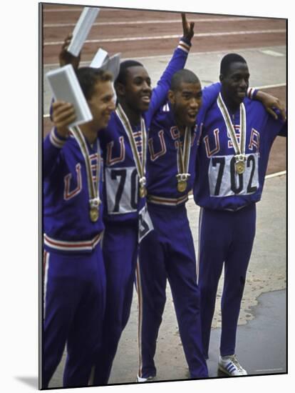 US Winning Team for the 4 X 100 Meter Relay at the Summer Olympics-George Silk-Mounted Premium Photographic Print