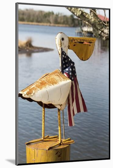 USA, Alabama. Whimsical pelican sculpture with American flag-Trish Drury-Mounted Photographic Print