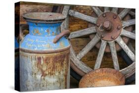 USA, Alaska. Antique milk can, wagon wheel and gold pan.-Jaynes Gallery-Stretched Canvas