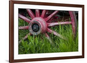 USA, Alaska, Chena Hot Springs. Vintage wagon wheel and grass.-Jaynes Gallery-Framed Premium Photographic Print