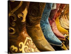 USA, Arizona, Old Scottsdale, Line Up of New Cowboy Boots-Terry Eggers-Stretched Canvas