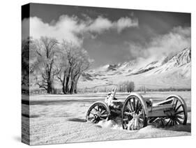 USA, California, Bishop. Snow-Covered Vintage Wagon in Owens Valley-Dennis Flaherty-Stretched Canvas