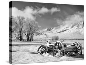USA, California, Bishop. Snow-Covered Vintage Wagon in Owens Valley-Dennis Flaherty-Stretched Canvas