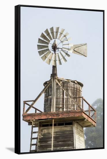 USA California. Cayucos, old wooden water tower with windmill for pumping-Alison Jones-Framed Stretched Canvas