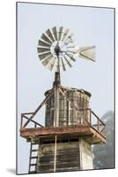 USA California. Cayucos, old wooden water tower with windmill for pumping-Alison Jones-Mounted Premium Photographic Print