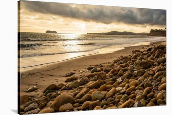 USA, California. Central Coast, Montecito, Butterfly Beach, drain and cobble eroded by King Tides-Alison Jones-Stretched Canvas