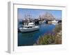 USA, California. Docked boats at Morro Bay with Morro Rock behind.-Anna Miller-Framed Premium Photographic Print