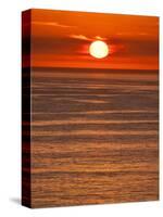 USA, California, La Jolla, Fiery sun drops into the Pacific Ocean-Ann Collins-Stretched Canvas