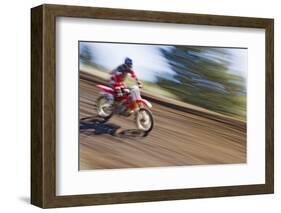 USA, California, Mammoth Lakes. Blur of motocross racer.-Jaynes Gallery-Framed Photographic Print