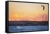 Usa, California, Rio Vista. Kiteboarder at sunset with wind farm turbines.-Merrill Images-Framed Stretched Canvas