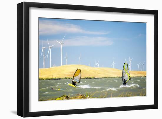 Usa, California, Rio Vista, Sacramento River Delta. Sailboarders with wind turbines.-Merrill Images-Framed Photographic Print