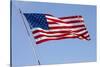 USA, California, San Diego. American flag waves above Liberty Station-Ann Collins-Stretched Canvas