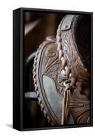 USA, Colorado, Custer County, Westcliffe. Tack room. Tooled leather western saddle.-Cindy Miller Hopkins-Framed Stretched Canvas