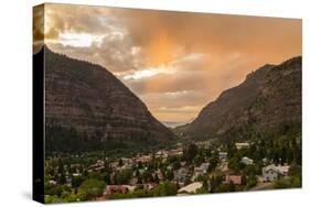USA, Colorado, Ouray. Stormy sunset on mountains and town.-Cathy and Gordon Illg-Stretched Canvas