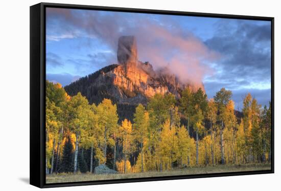 USA, Colorado, San Juan Mountains. Chimney Rock formation and aspens at sunset.-Jaynes Gallery-Framed Stretched Canvas