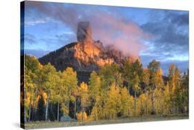 USA, Colorado, San Juan Mountains. Chimney Rock formation and aspens at sunset.-Jaynes Gallery-Stretched Canvas